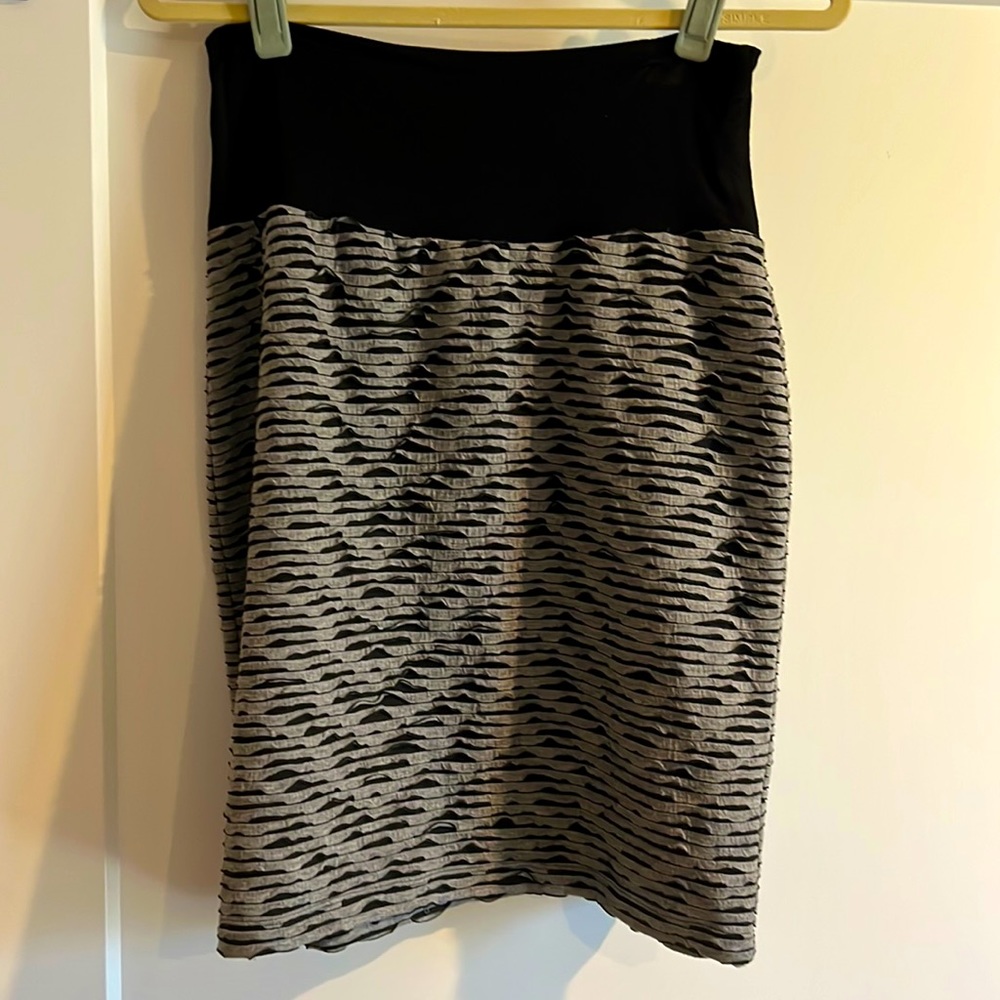 Tube skirt for flattering fit. Great with leggings.